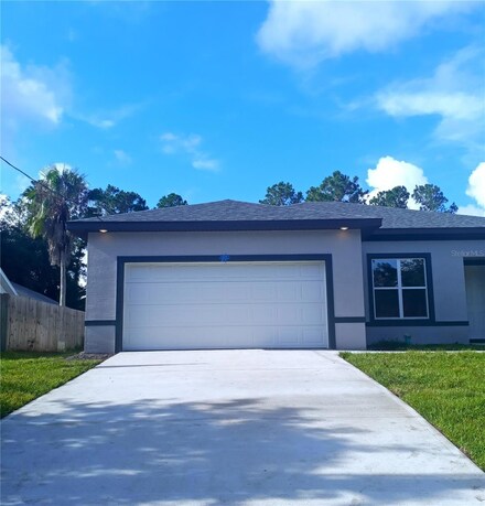60 Raleigh Dr, Palm Coast, FL 32164