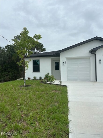 447 Bell Blvd, Lehigh Acres, FL 33974