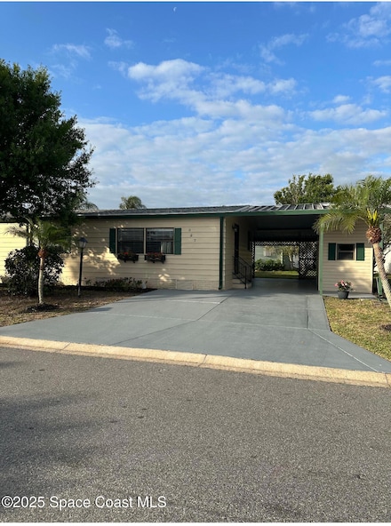327 Macadamia Dr, Barefoot Bay, FL 32976