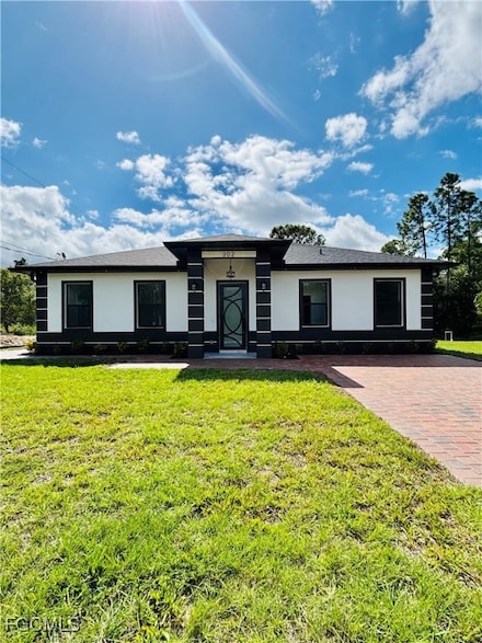 302 E 15th St, Lehigh Acres, FL 33972