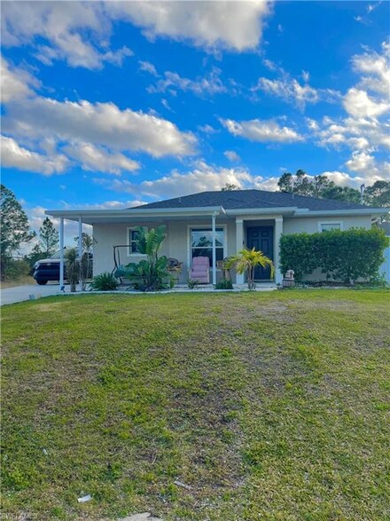 854 Campbell St E, Lehigh Acres, FL 33974