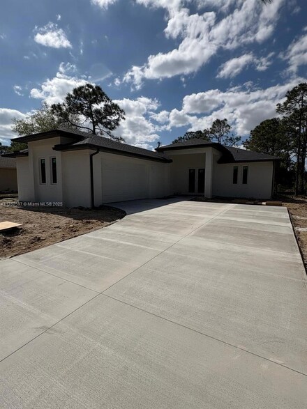 727 Anaconda Ave S, Lehigh Acres, FL 33974