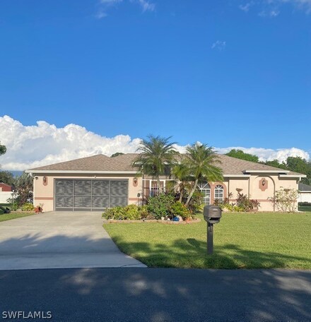 1622 Cheshire Cir E, Lehigh Acres, FL 33936