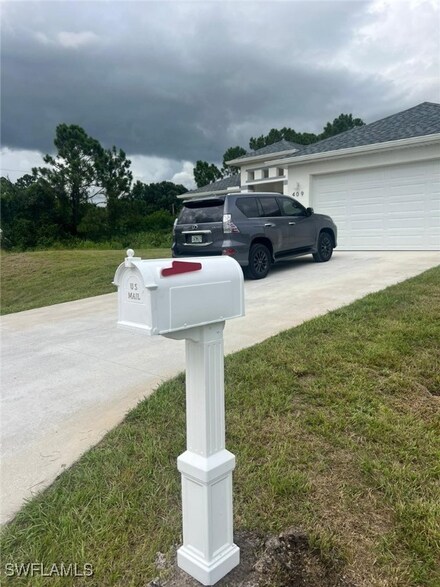 409 Limerick Ave S, Lehigh Acres, FL 33974