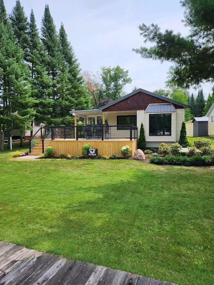 6401 Swallow Dr, Harrison, MI 48625