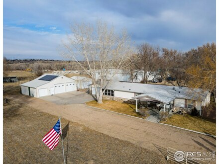 105 Cedar St, Log Lane Village, CO 80705