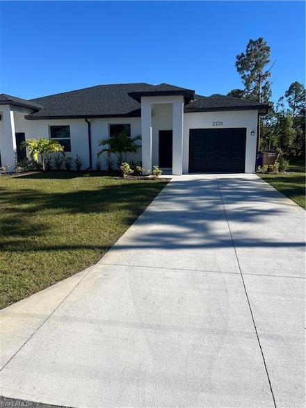 2231 Armour Rd, Lehigh Acres, FL 33973