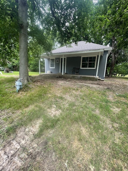 205 1st St, Pecan Gap, TX 75469