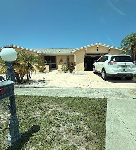 2043 Sugarbush Dr, Holiday, FL 34690