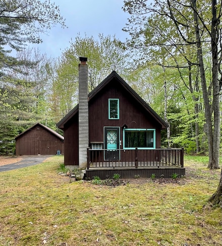 7125 Clinton Ave, Carp Lake, MI 49718
