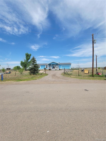 58117 E 42nd Dr, Strasburg, CO 80136