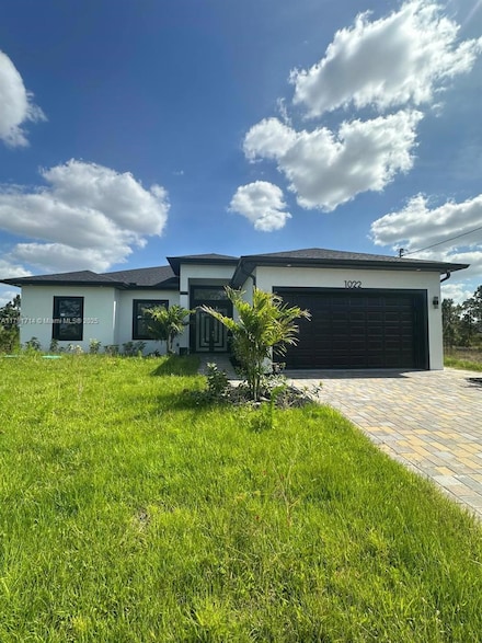 1022 Candlelight Dr, Lehigh Acres, FL 33974