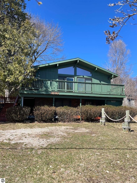 11610 SW Torch Lake Dr, Rapid City, MI 49676