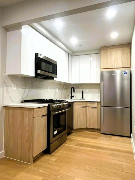 116-17 Grosvenor Ln Unit 1A, Richmond Hill, NY 11418