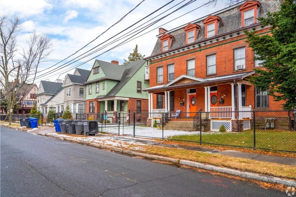 Single-family homes line a residential street in the Asylum Hill neighborhood of Hartford, Connecticut. (CoStar)