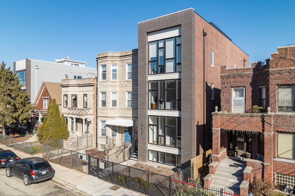New construction abuts older houses in Chicago's Humboldt Park neighborhood. (CoStar)