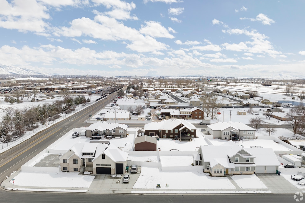 Homes in Marriott-Slaterville, Utah, sit under a thick blanket of snow in this photo from 2023. (Marcel De Lima/CoStar)