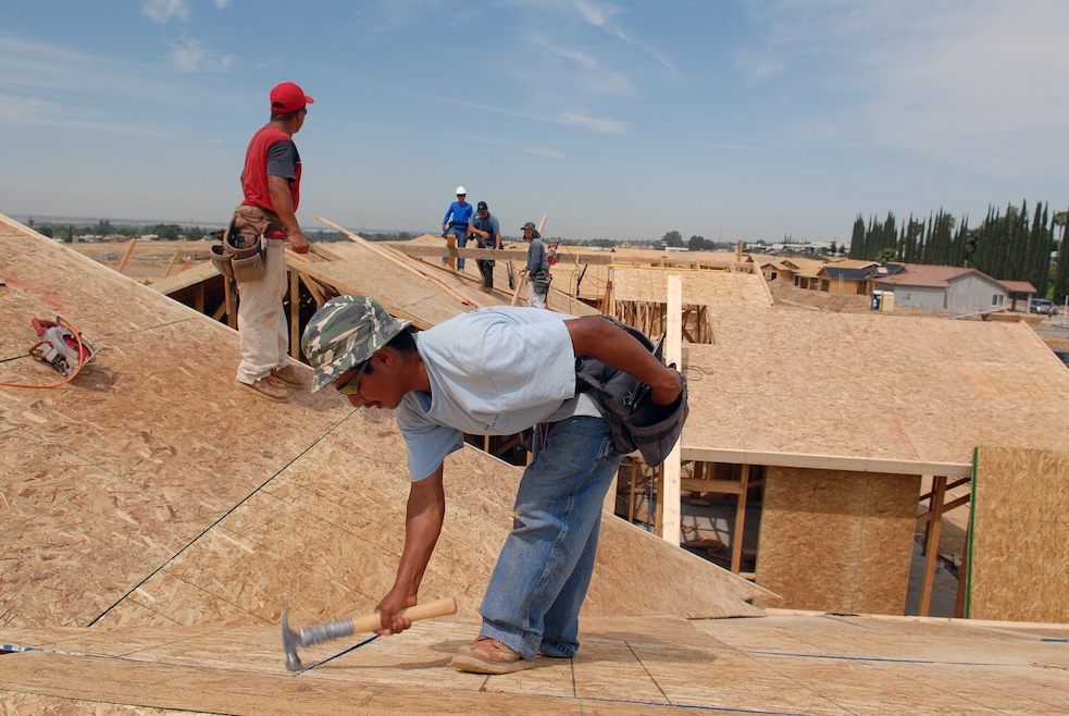 Workers construct new houses in 2024 in Bakersfield, California. (Getty Images)