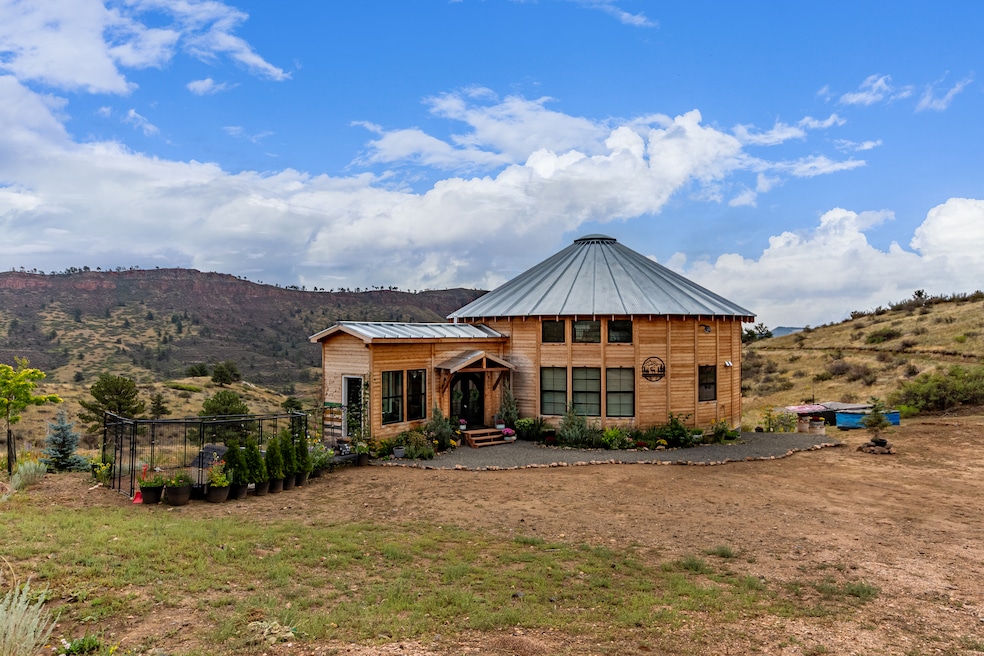 The circular home is made out of wood and has a tin roof. (Rocket Lister Photos) 