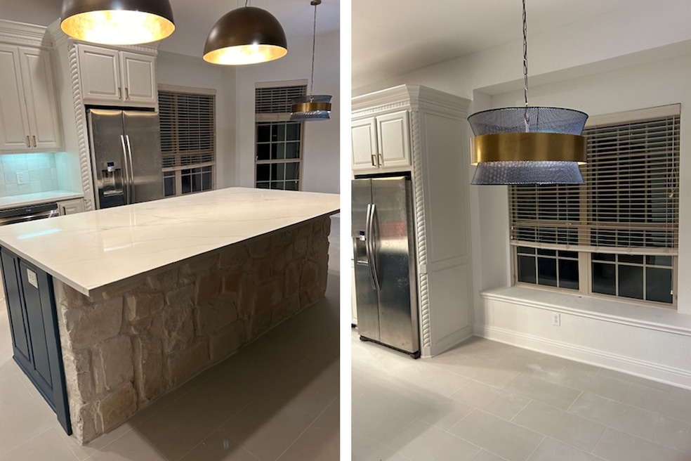 Above, a kitchen renovation by CayWill Inc. of Sanford, Florida, that brightened up and modernized a space that used to have very dark cabinetry. (J. Mark Williams) 