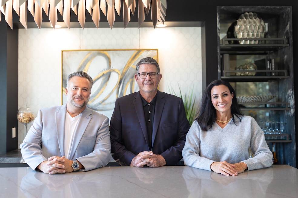 From left to right: Jerry Braklow of SunWest, Rob Hill of Platinum Realty and Monet Deshler of SunWest. (Platinum Realty)