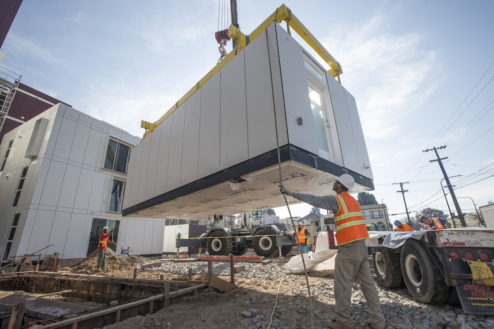 Builders set modular homes on a property at the University of California, Berkeley in 2016. (Getty Images)