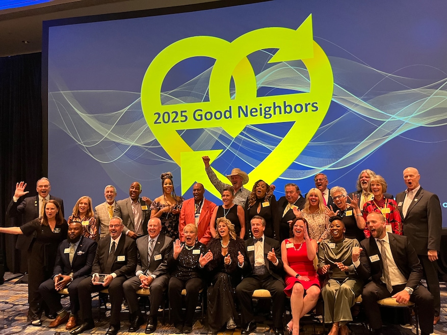 Recipients of the Good Neighbors awards gathered in Houston. This year's finalists and winners are in the front row. (Caroline Broderick/Homes.com)