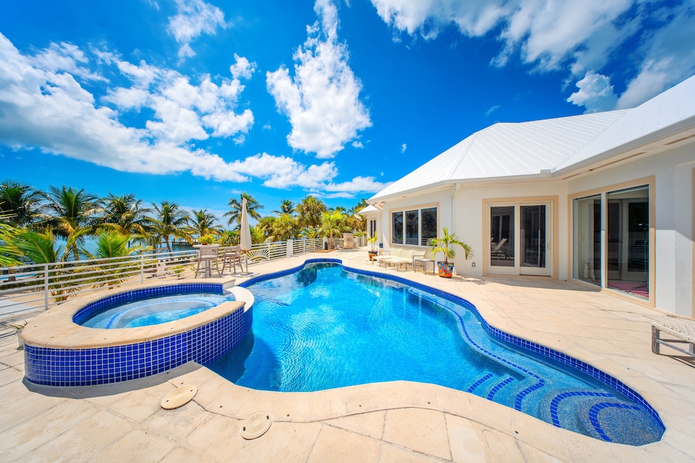 The home on Summerland Key has 120 feet of ocean frontage. (Platinum Luxury Auctions)