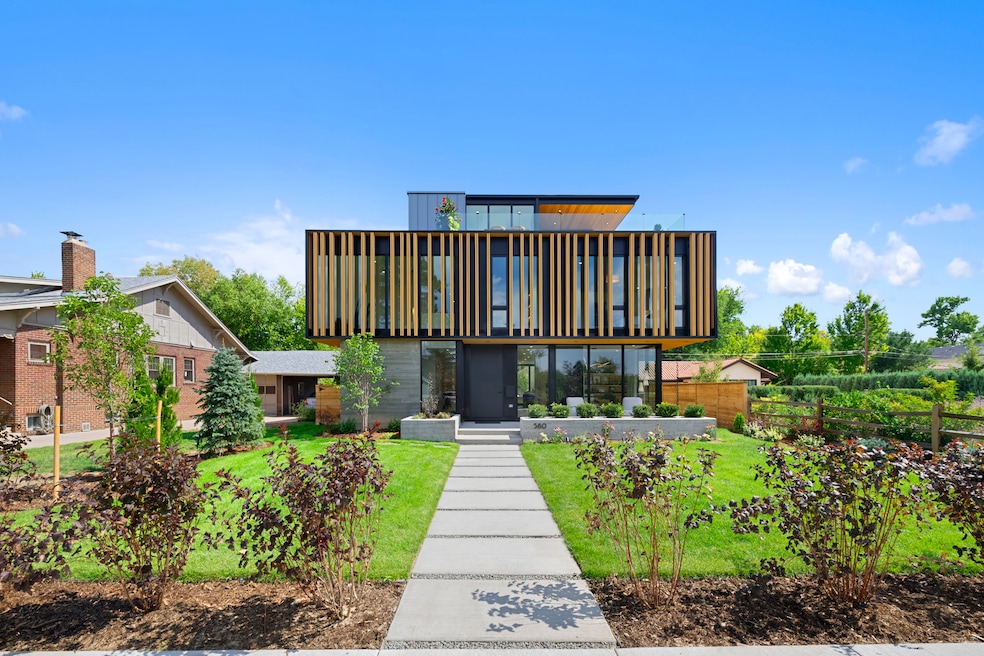A four-story modern style house in the Washington Park Neighborhood for $5.9 million sits at 580 S. Franklin Street in Denver. (milehimodern) 