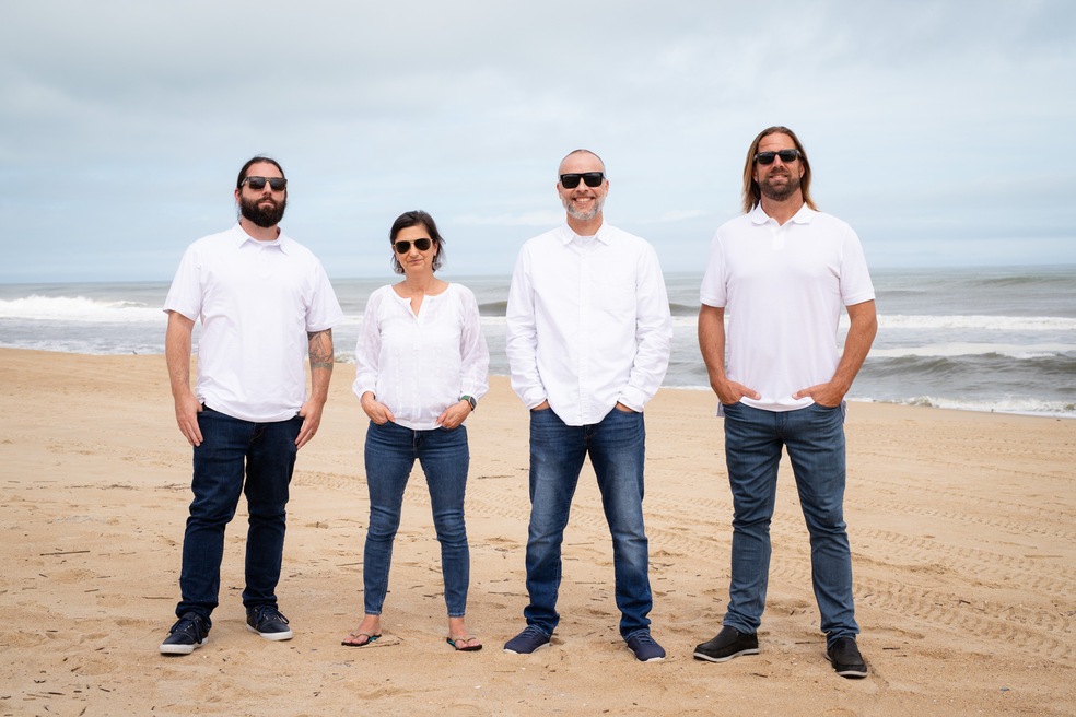 The Outer Banks Island Guys team includes (left to right) Anthony Leone, Cara Muglia, Adam Burkhimer, Shane Collins and his wife, Karen (not pictured). (Serhant)
