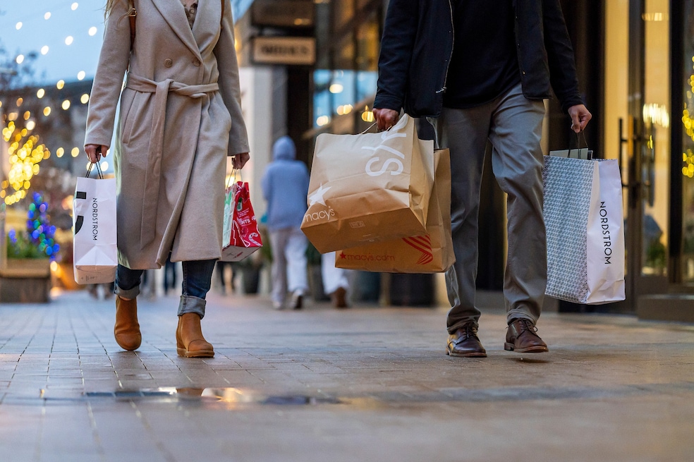 Shoppers plan to maintain their gift budgets but will cut other holiday expenses. (Getty Images)