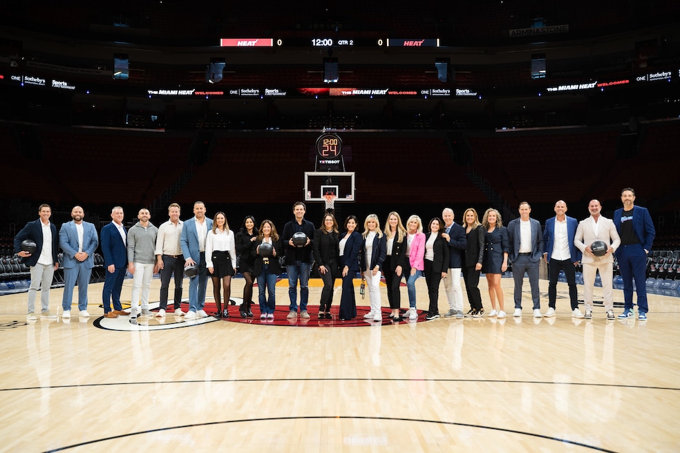 Agents in the sports and entertainment division of One Sotheby's International Realty gather on the home court of the Miami Heat. (One Sotheby's International Realty) 