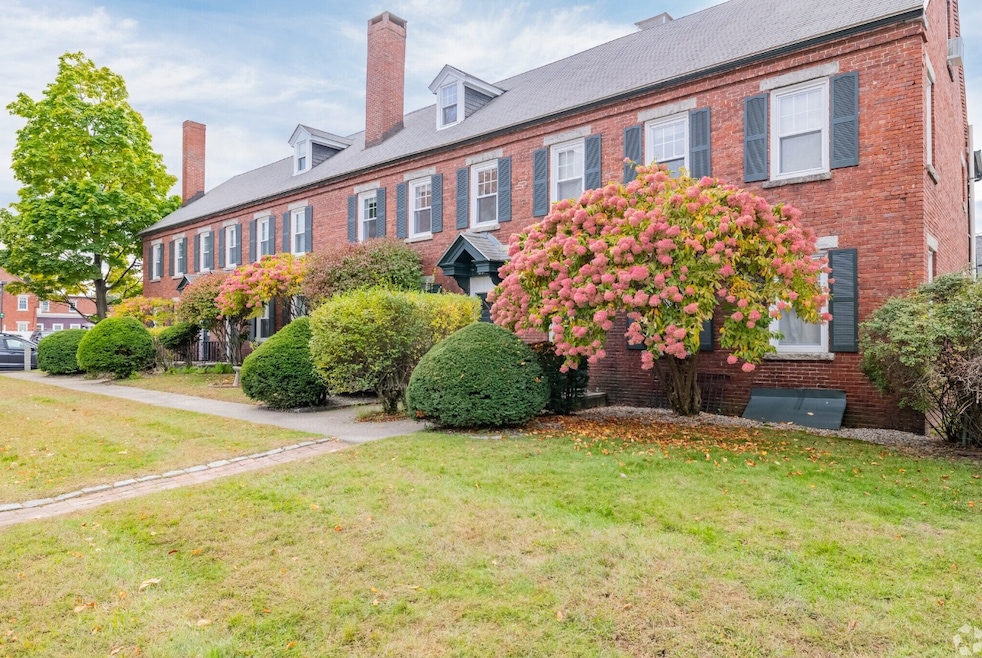 A condominium building in Manchester, New Hampshire — the state where median home prices reached $545,000 in July. (CoStar)