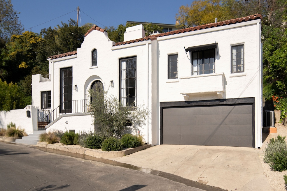 The first house built in the Hollywoodland development of Los Angeles in 1924 is on the market. (Gavin Cater)