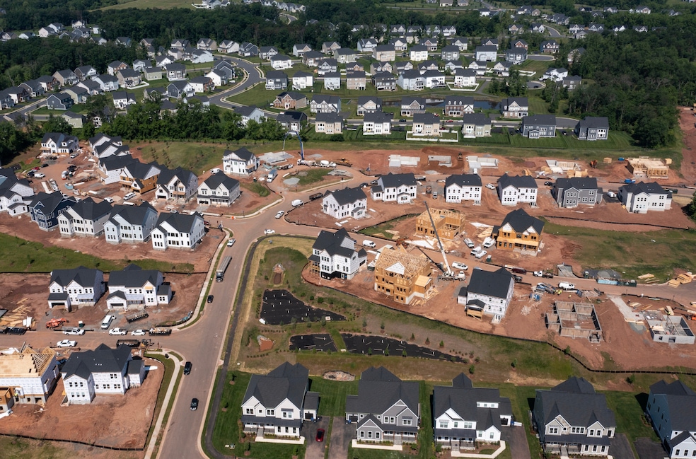 Single-family homes under construction in Aldie, Virginia. (Bloomberg via Getty Images)