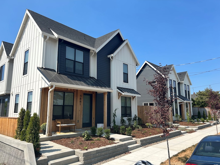A newly built four-unit house designed to blend into an older neighborhood with single-family-detached homes in Portland, Oregon. (City of Portland)