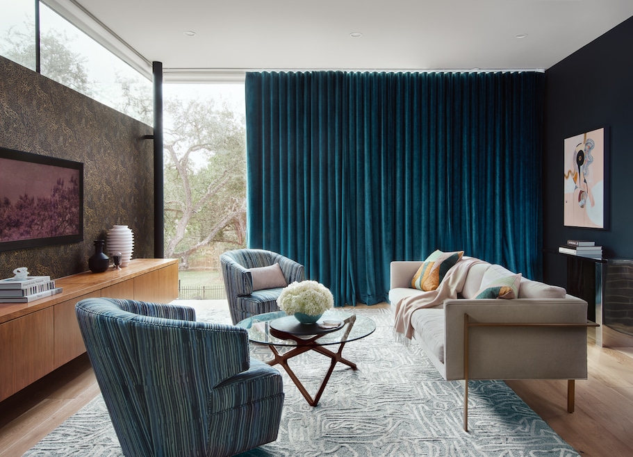 Heavy drapes can keep sunlight from heating a room. (Leonic Furmansky)