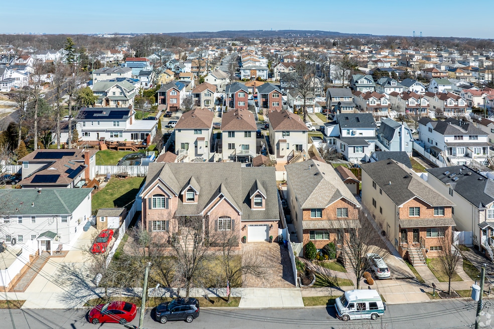 An aerial photo captures homes in the Annadale section of Staten Island, a New York City borough where median home prices fell 2.9% year over year in July. (CoStar)