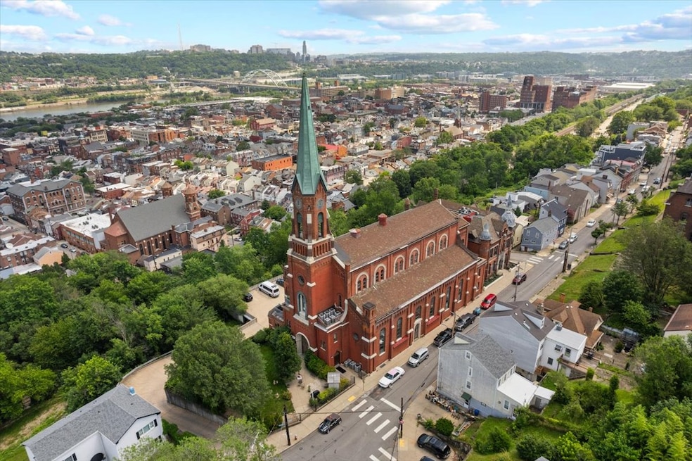 A unit with the former St. Michael's Church steeple is on the market in Pittsburgh. (Stephen Donnelly)