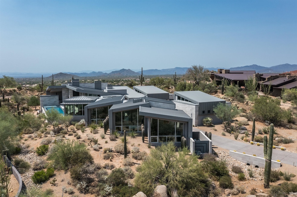 The single-story residence is made of stucco, glass and steel. (Provisuals Media)