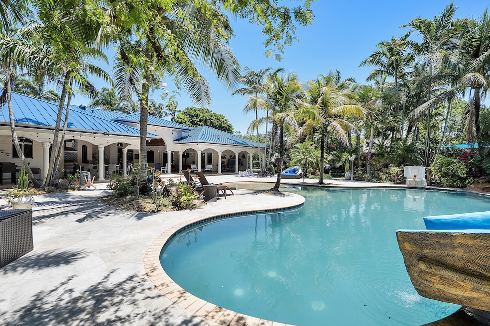 The listing at 15960 SW 250th St. in Homestead has a new roof and ample room outside for recreation and entertainment. (Miami Real Estate Images)