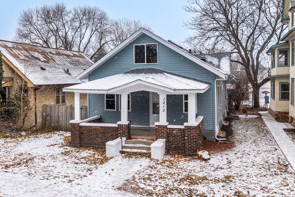 Homeowners are advised to be careful when shoveling snow from their roofs such as this&nbsp;Craftsman cottage in Sheridan, Minnesota. (Lia Huemoeller/CoStar) 