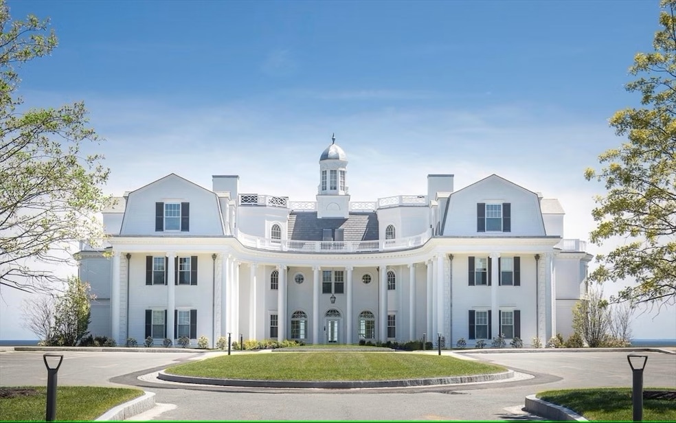 While the front of the condo building closely resembles the 1895 house it replaced, the rest of the property has a more contemporary look. (Madore Photography)
