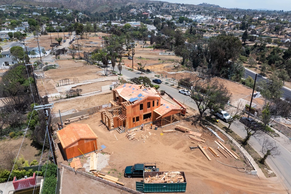 Rebuilding is already underway at some sites in Pacific Palisades, California. (VCG via Getty Images)