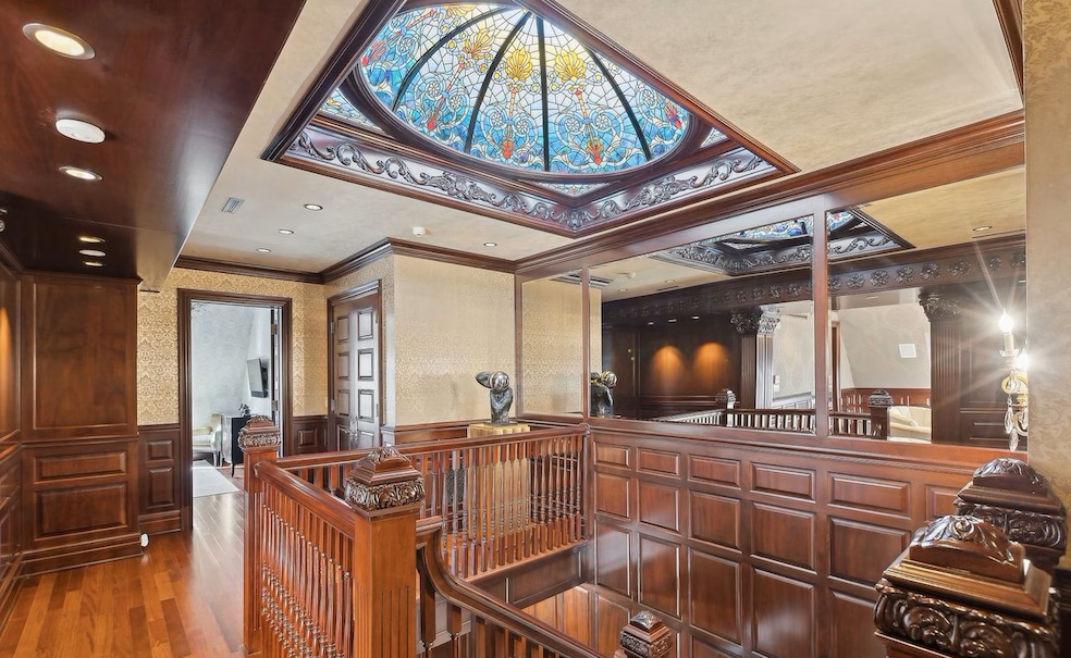 The 1888-built home includes a custom stained glass dome. (Baird &amp; Warner)