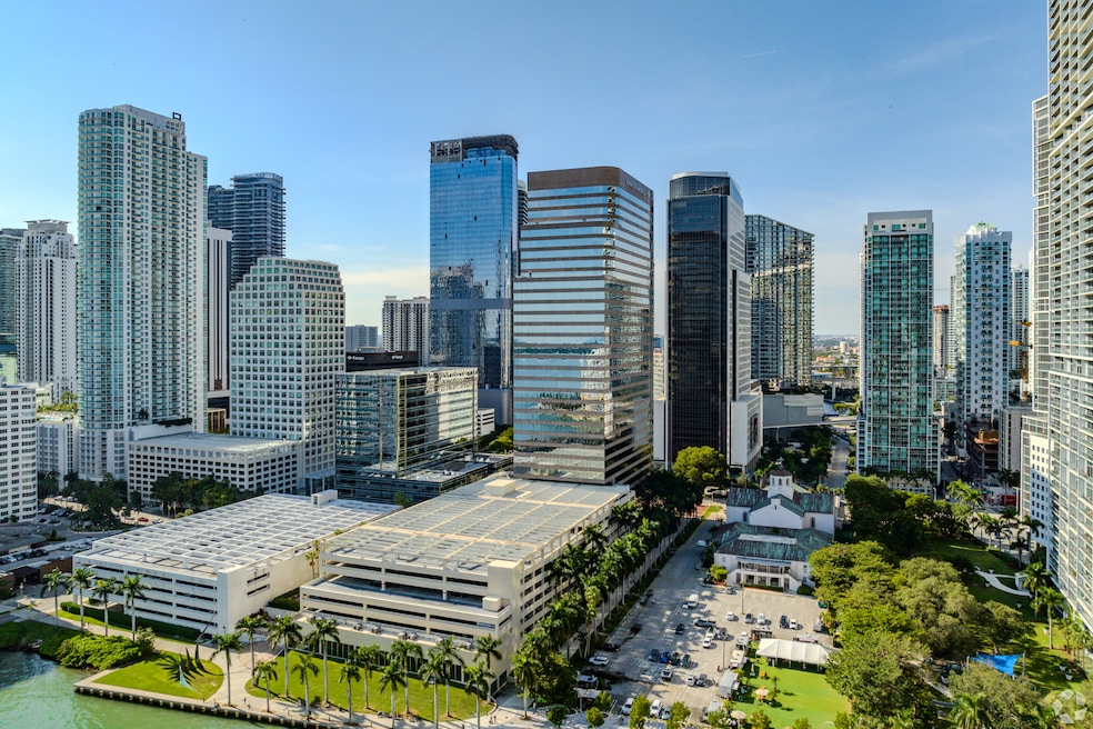 First Miami Presbyterian Church at 609 Brickell Ave., above on the right, sold 2.2 acres of its waterfront land for $240 million in 2022.  (CoStar)