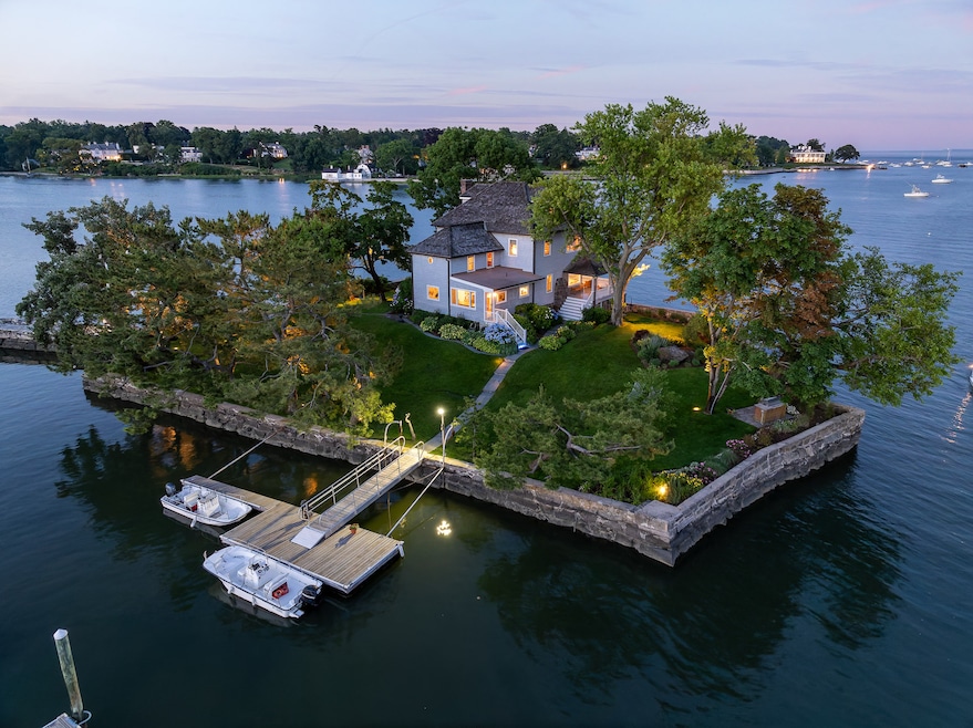 The owners of 0 Rich Island said they used the six-bedroom home to create countless family memories, including painting driftwood. (Daniel Milstein)