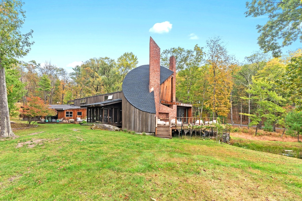 Architect John Storyk designed this Woodstock, New York, home for his parents in 1969. (Berkshire Hathaway Home Services)