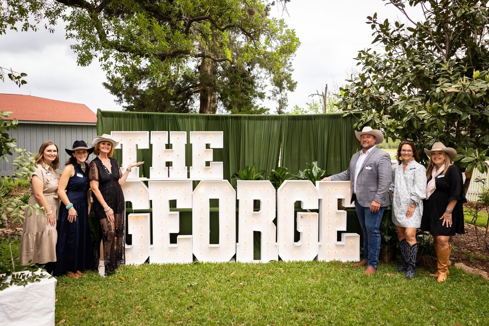 Members of The George development team are, from left, Amanda Flynt, Anne Claire Pope, Tammy McCall, Vice President and General Manager Derek Goff, Carrie Roehling and Megan Maloney. (Johnson Development)