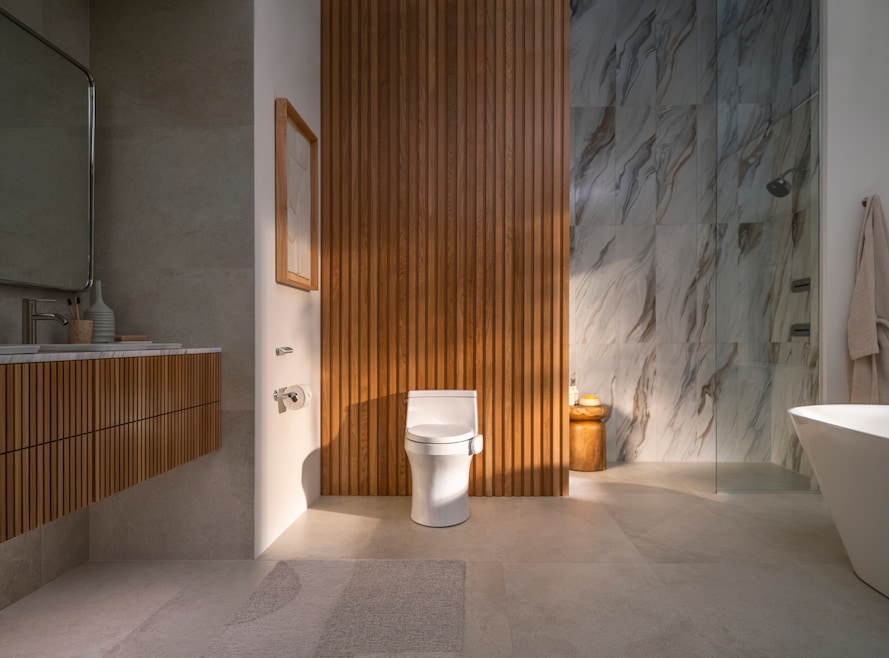 Kohler’s new “Dekode” clamps onto the side of a toilet bowl. (Kohler Health)